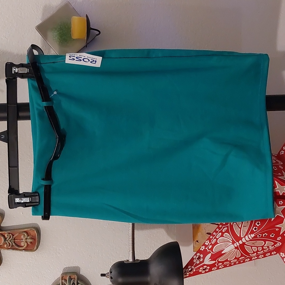 Emerald green bodycon pencil skirt with faux patent leather belt
